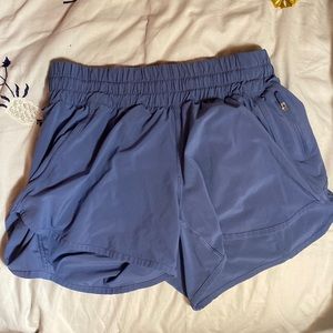 Size 6 Lululemon workout shorts with zipper pocket